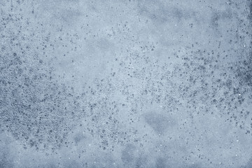 Rain drops on a water