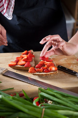 Making a strawberry sandwich