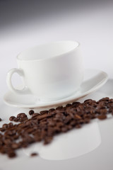 Cup with coffee beans