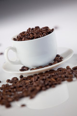 Cup with coffee beans