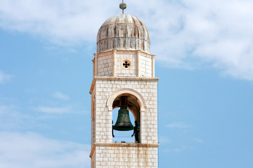 Fototapeta na wymiar Old metal bell on tower in Dubrovnik