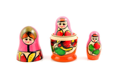 Wooden Russia matryoshka dolls over white background