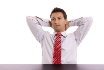 young business man on a desk thinking at the office