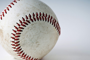 Closeup of a well worn baseball