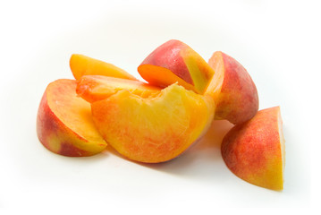 peach slices on white background
