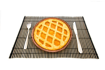 Sweet pie isolated on the green background