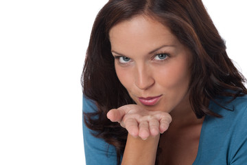 Brown hair woman blowing a kiss