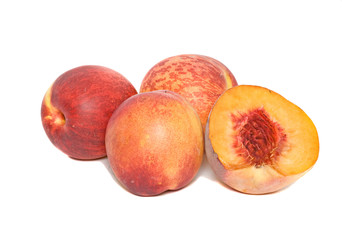 Peaches and section isolated on white background