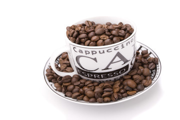 Cup and coffee beans