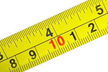 Close-up shot of yellow metal measurement tape
