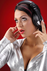 Woman with headphones listening to music