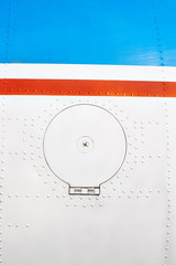 Airplane fuselage with filling tank door cover