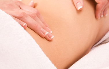 Young woman being massaged