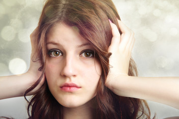 Fototapeta premium I'm not listening Shut up. Teen age girl covering her ears