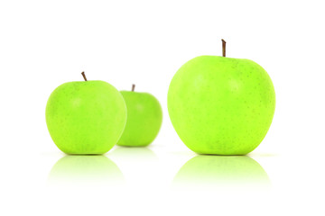 three fresh green apples