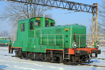 Obraz premium Portrait of a green diesel locomotive
