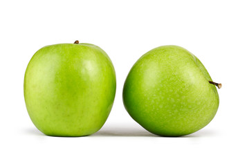 Fresh green apples on white background