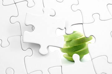 Fototapeta premium puzzle and apple
