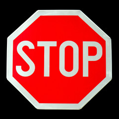 Stop sign on black