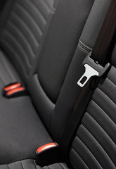 Modern car interior - rear seats with the seat belts