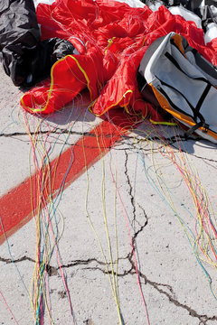 Unfolded part of parachute with colored shroud lines