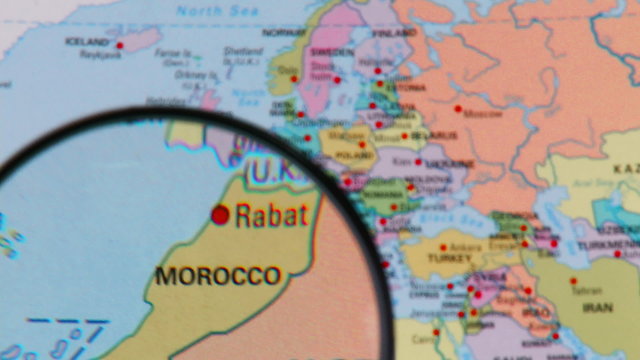 Magnifying glass showing the countries of the world