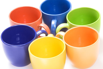 Color cups isolated on white background.