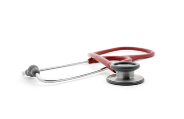 Red stethoscope over white background