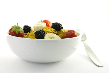 Cornflakes and Fruit in a White Bowl with Spoon