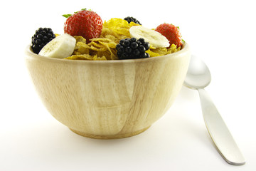 Cornflakes and Fruit in a Wooden Bowl with Spoon