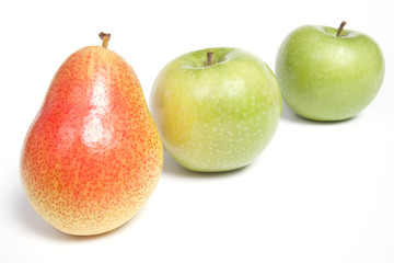 Arranged pear and green apples, isolated on white