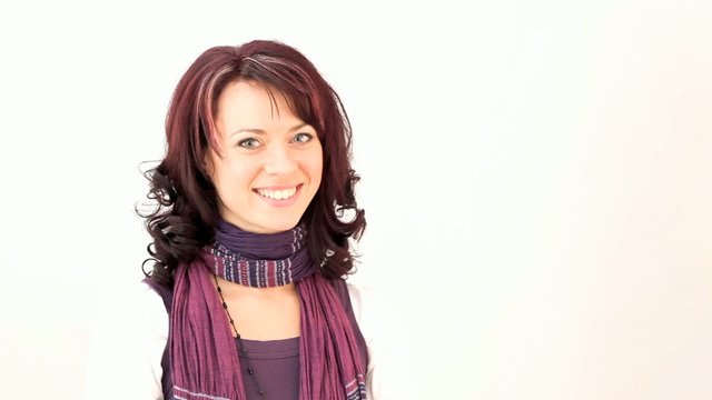 in die Kamera l&auml;cheln