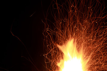 Abstract of spark and flame on black background