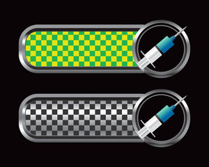 Syringe on green and black checkered tabs