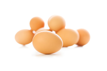 Many eggs on white - shallow depth of field