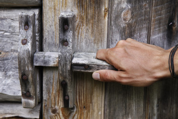 Hands open door