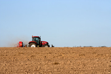 Tractor with plough