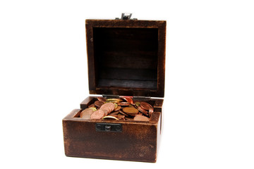 A wooden ancient chest full of money..