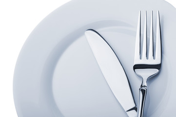 Knife and fork on a plate