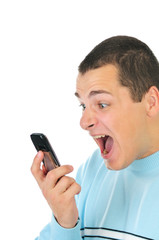 Angry man shouting at the phone isolated on white