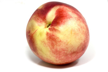 single peach in close up