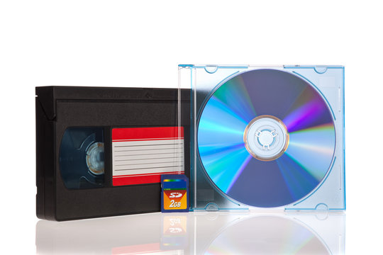Old Video Cassette tape, with a DVD disc and Flash Memory Card