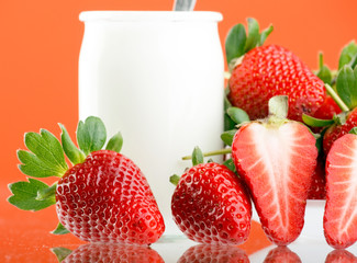 Fresh and tasty strawberries and yogurt.