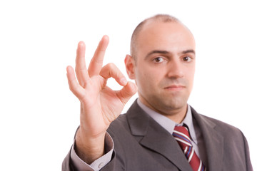Business man signaling ok