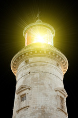 lighthouse illuminated
