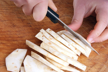 Obraz premium cut one organic celery in stripe for a soup