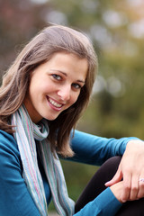 Closeup portrait of a happy young woman smiling