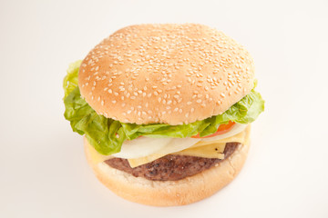 Fresh homemade Beef tomato cheese onion burger isolated