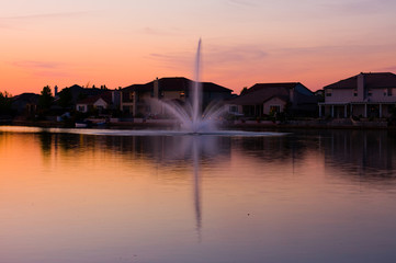 Homes by the lake at sunset