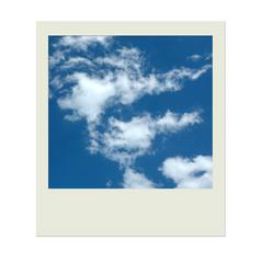 Polaroid with blue sky